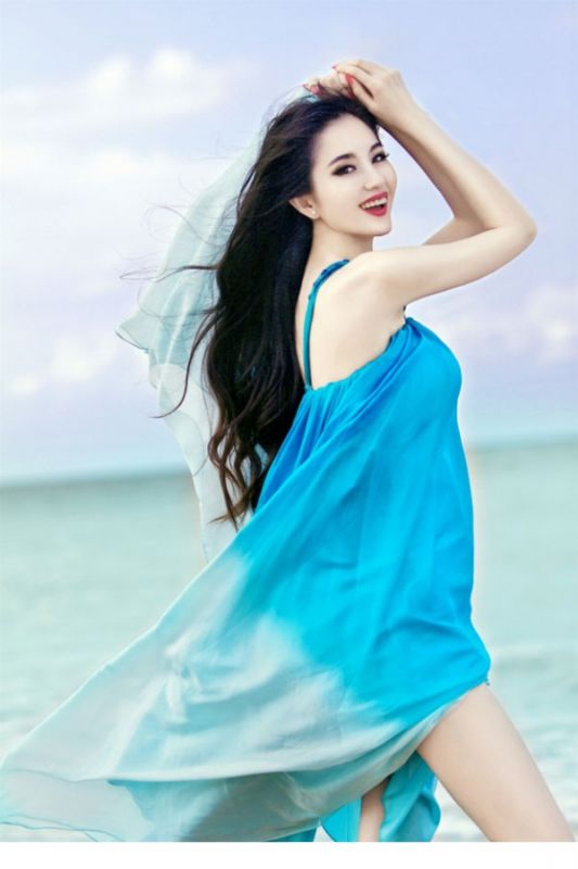 蓝燕海边性感长裙迷人写真