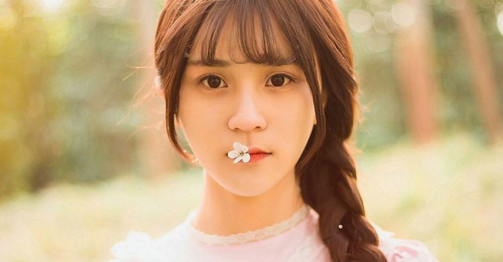樱花树林下娇羞清纯白嫩少女可爱辫唯美户外写真