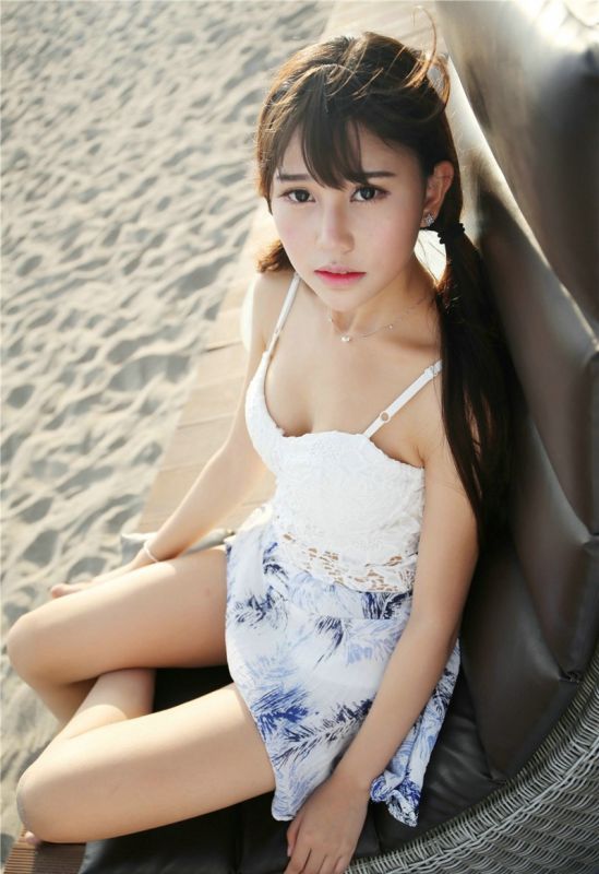 双马尾美女Milk楚楚沙滩迷你裙美腿诱惑性感写真图片