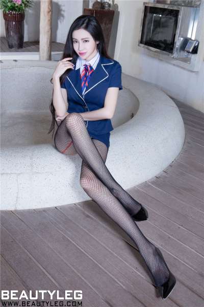 大长腿空姐Avril黑丝网袜室内写真高清图片