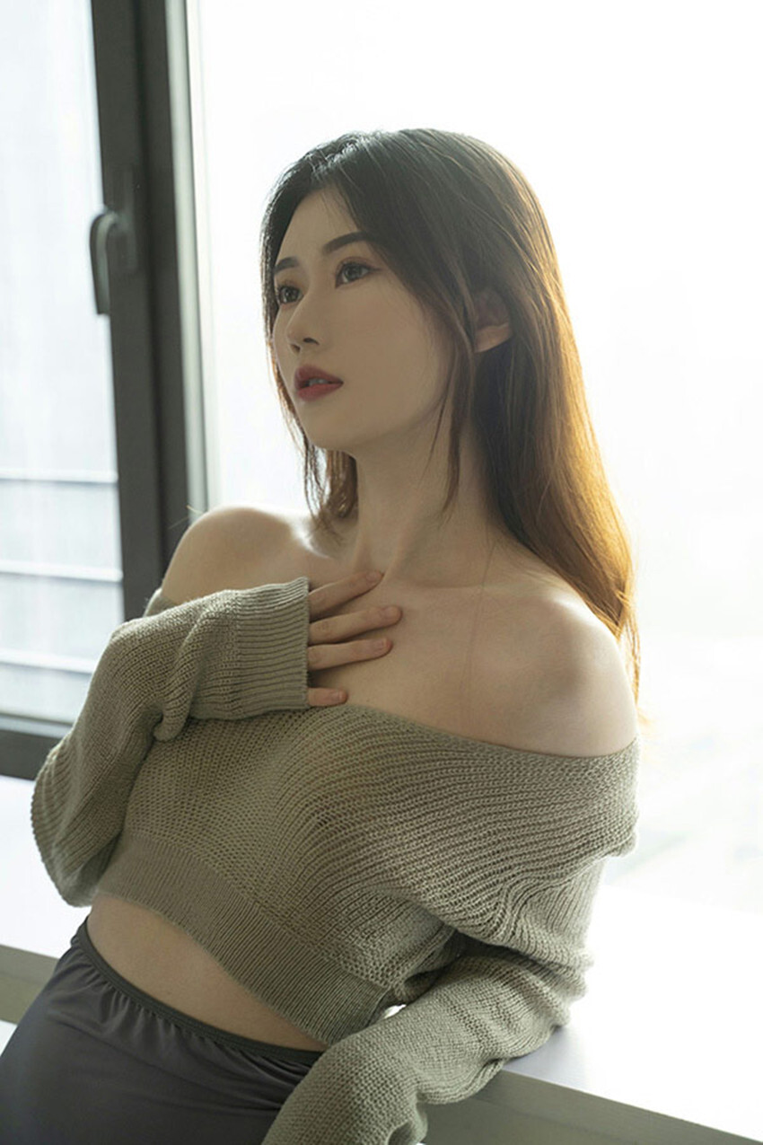 绿色毛衣
